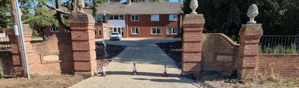 This is a photo of a newly installed chip and tar driveway, installed by NS Driveways Farnham